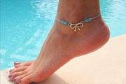 Женские золотые браслеты на руку и на ногу