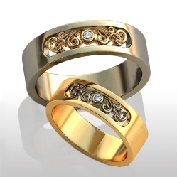 Обручальные кольца с бриллиантом.