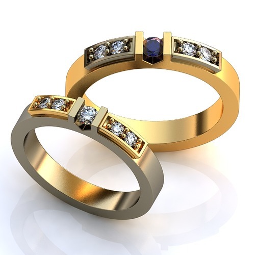 Обручальные кольца с бриллиантами и сапфиром - фото